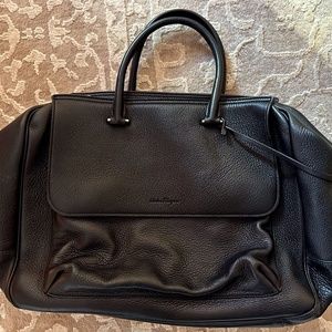 Salvatore Ferragamo Black leather bag. ( Italian )